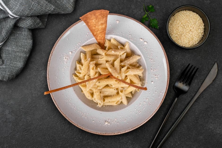 Plated crockpot creamy sausage pasta