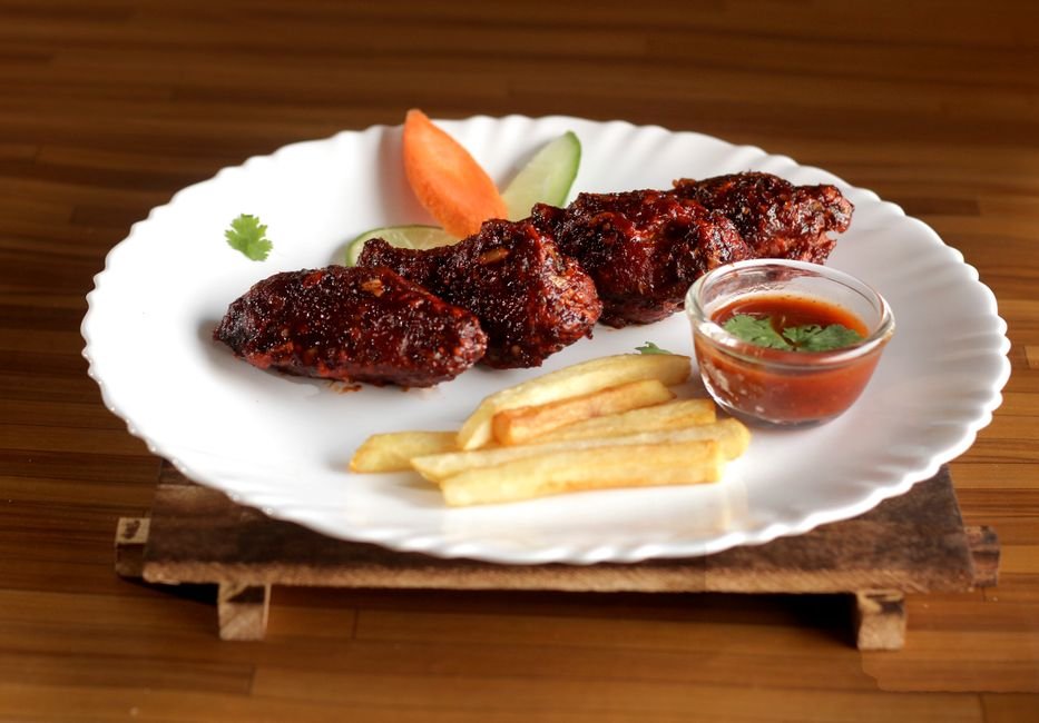 Plated honey garlic chicken wing